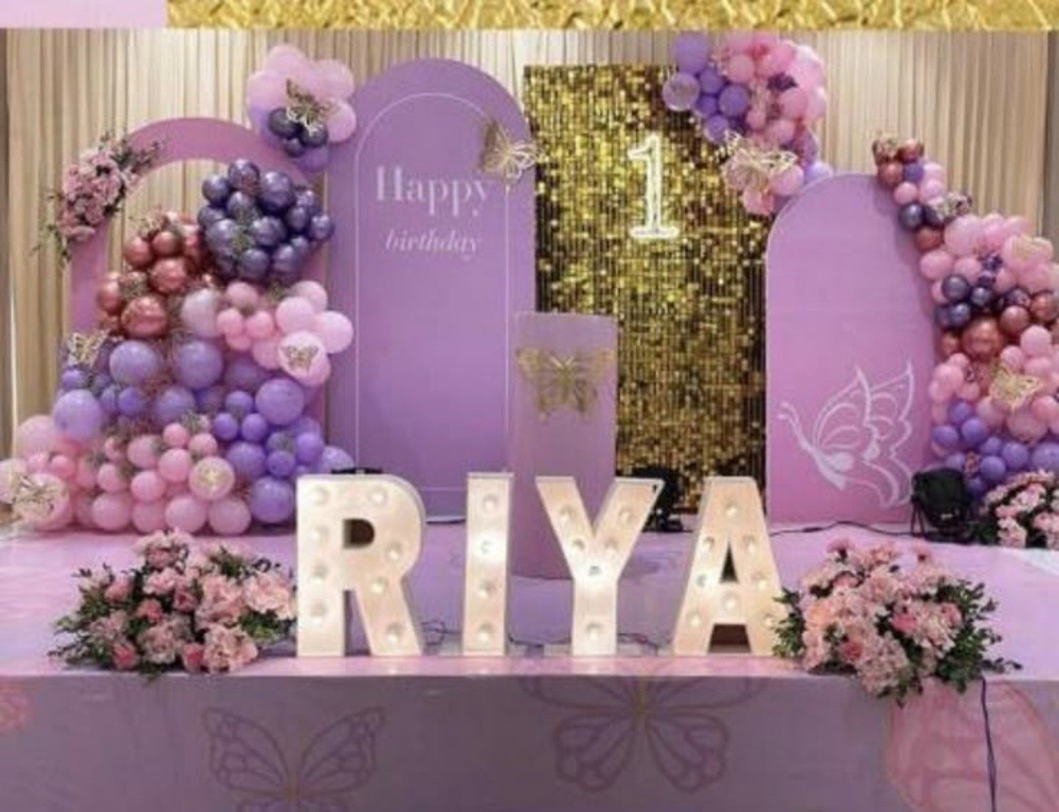 Elegant lavender and pink first birthday stage decoration